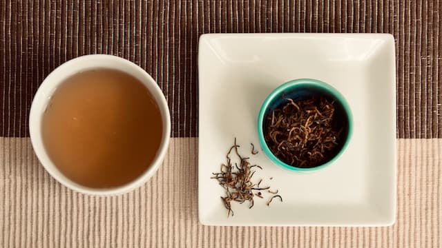 White ceramic bowl with brown liquid