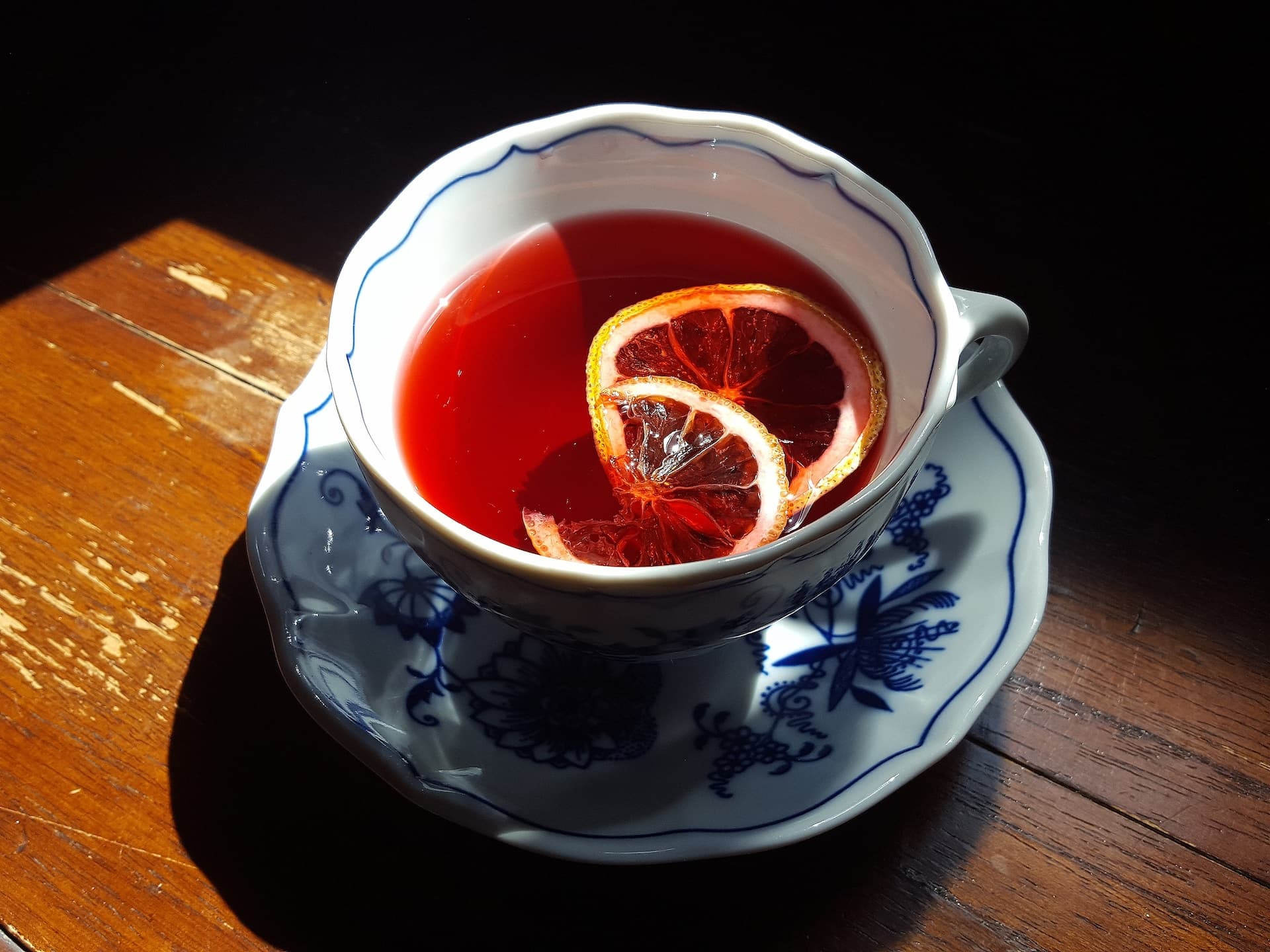 White ceramic teacup with tea